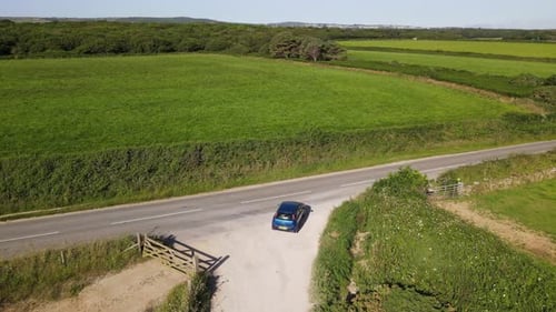 The car is moving on a country road. Slow motion