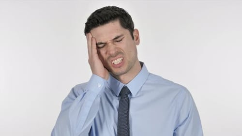 Young Adult Man Suffering with Headache on White Background
