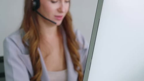 Business People Wearing Headset Working in Office