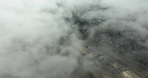 Aerial View of Smog and Pollution Hanging Over City.