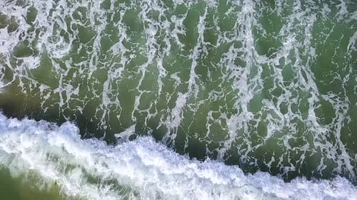 View From the Top on the Splash From the Waves Creates a Unique Pattern on the Water. Aerial Survey