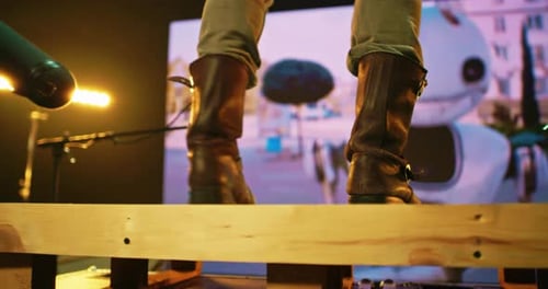 Close up of Boots on Plank