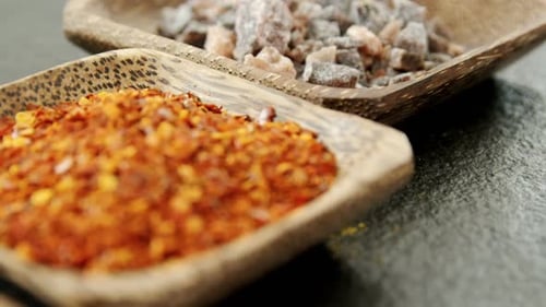 Colorful Spices Arranged in Wooden Bowls