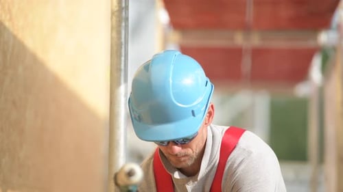 Construction Worker in Blue Hard Hat