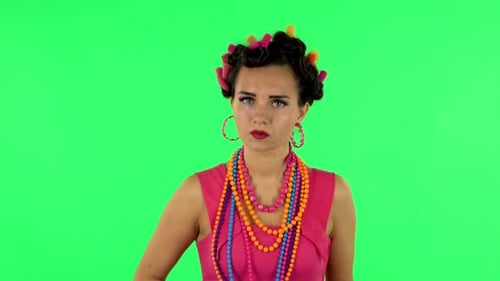 Angry Woman with Rolling Pin on Green Screen