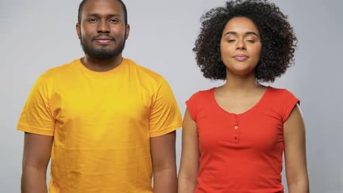Smiling Couple Embracing in the Studio