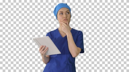 Young woman doctor or nurse in scrubs, Alpha Channel
