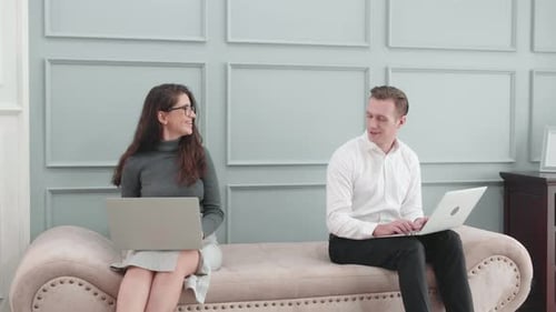 People Working Together on Laptops