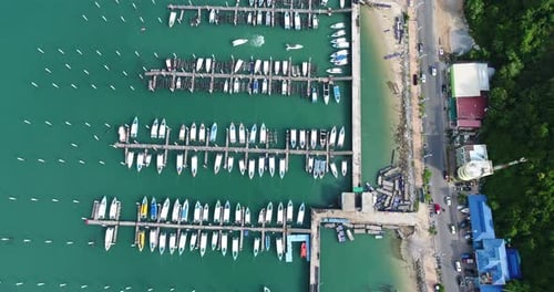 Aerial view of speed boats on the sea near beach city