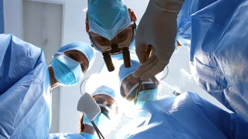Surgical Team Performing Operation in Hospital Operating Room