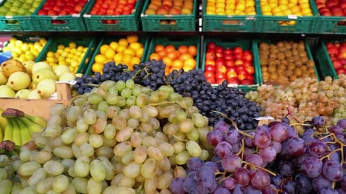 Showcase with Grapes and Other Fruits on the Street Market