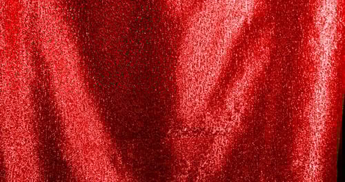 Red Shimmering Fabric Reveals Black Background
