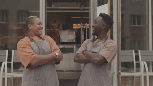 Waiters Posing Outside Cafe