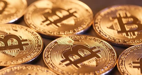 Close Up of Shiny Gold Bitcoin Coins