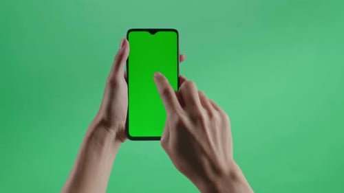Hand Tap Touch Green Screen Smartphone On The Green Screen Background