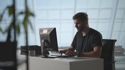Businessman Working on Computer at Home Office