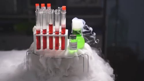 Test Tubes and Beakers with Vapor in Lab