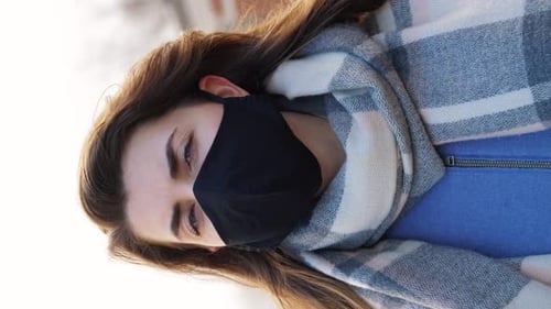 Woman Wearing Protective Reusable Barrier Mask