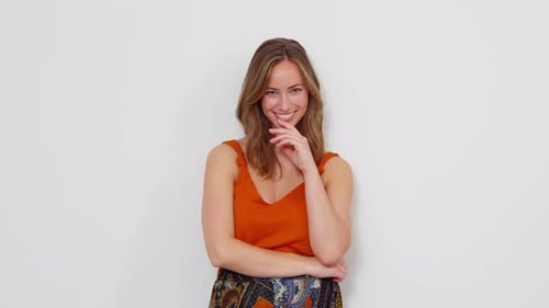 Smiling Young Woman Posing in Studio