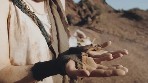 Lone Figure Amidst Barren Post-Apocalyptic Wilderness