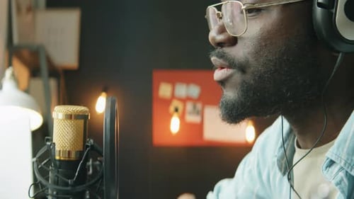 African American Singer Recording Music at Home Studio