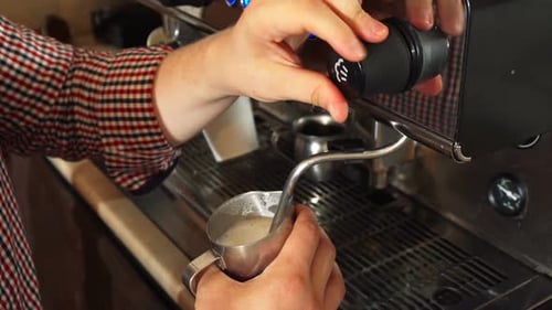 Steaming Milk with Espresso Machine Close Up