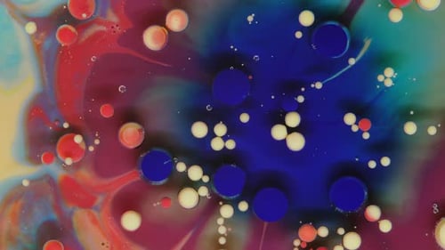 Colorful Paint Drops Mixing Abstractly