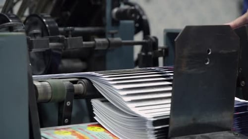Industrial Printing Press Stacking Paper Sheets