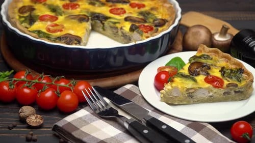Traditional French Baked Homemade Quiche Pie on Wooden Board