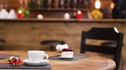 Cupcakes and Cakes with Coffee on Table
