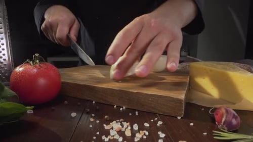 Chef Chops the Onions on the Wooden Board at the Kitchen, Raw Vegetables, Close Up Shot of Cooking