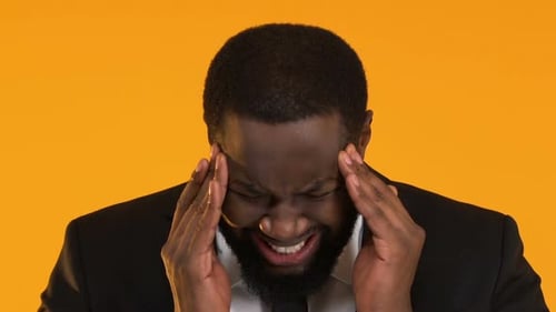Man in Suit Massaging Head, Suffering From Migraine Pain, Stressful Work Result