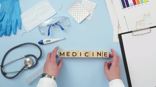 Medical Tools with Blocks Spelling Medicine