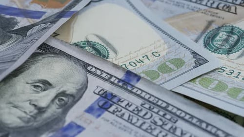 Rotating stock footage shot of $100 bills - MONEY 0131
