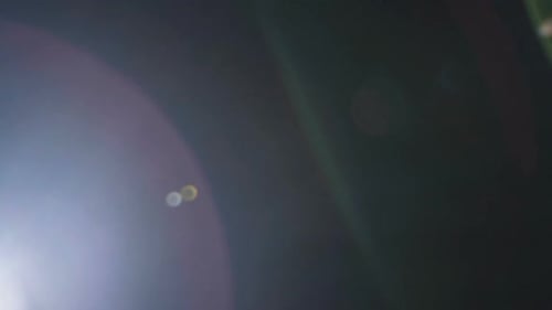 Efecto de destello de lente óptica en negro
