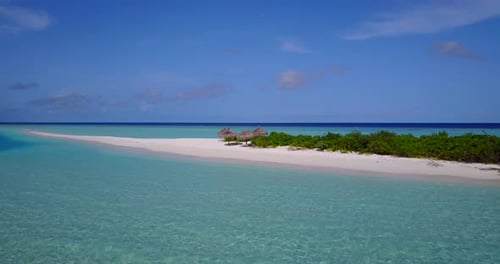 Beautiful birds eye abstract view of a summer white paradise sand beach and aqua blue ocean backgrou