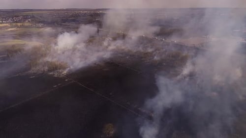 Aerial View of Fire Consuming Field