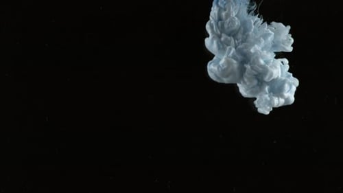 Slow motion shot of light blue ink on black background, shot with Phantom Flex 4K camera.