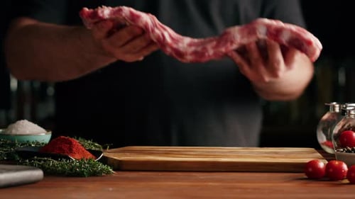 Man Chef Cooking Ribs Closeup