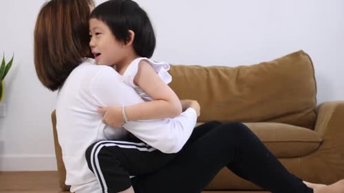 Mother and Child Loving Embrace at Home