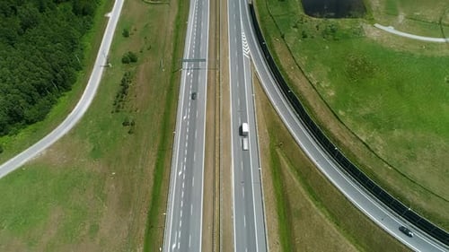Drone view of highway and overpass in the city