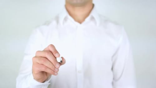 Man Writing "Buy" on Transparent Surface