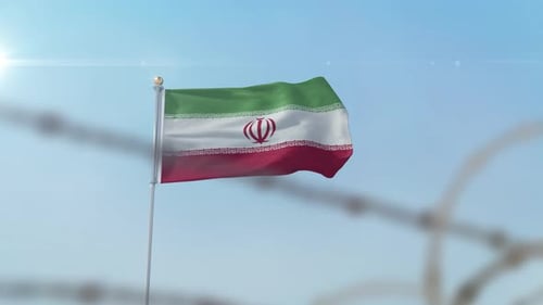 Realistic Iran Flag Waving Behind Barbed Wire with Lens Flare