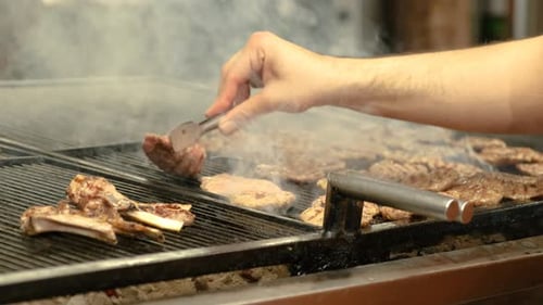 Cooking Cow Meatball Food on a Barbecue Wood Fire