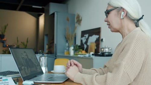 Business Lady Talking to Partner Making Online Video Call From Apartment