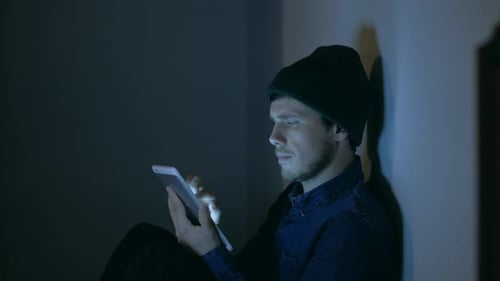 Man Use Digital Tablet at Night