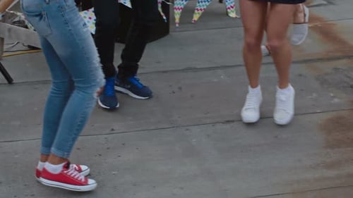 Friends Dancing at Rooftop Party