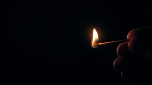 Burning Matchstick Flame in the Dark