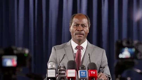 Man Delivering a Speech at a Press Conference