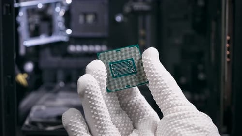 The Hand Holds the Central Processing Unit